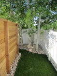 Lawn Care and Dog Urine solution - side yard with fenced off pathway for dog use.