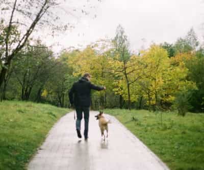man walking his dog