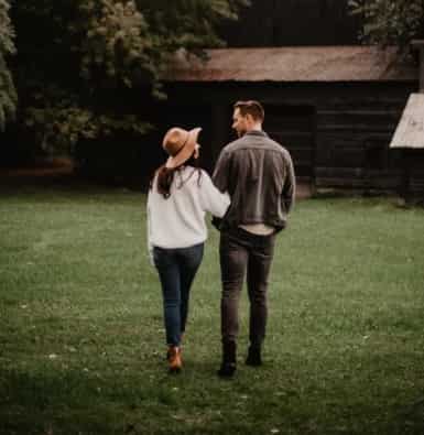 couple walking arm in arm